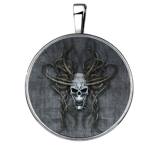 Pendentif montre tête de mort argenté 15 en 1