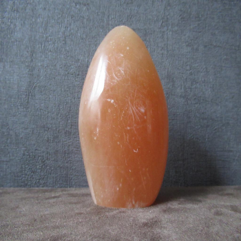 Pierre de calcite orange polie