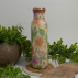 Bouteille d’eau en cuivre pur imprimé floral vert/rose/blanc ± 950 ml